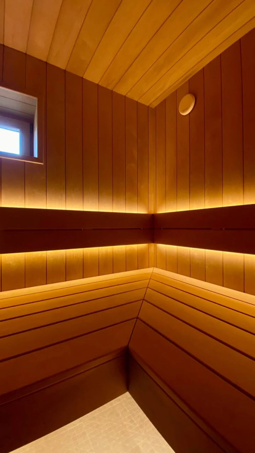 Corner bench joinery and integrated wall ventilation outlet