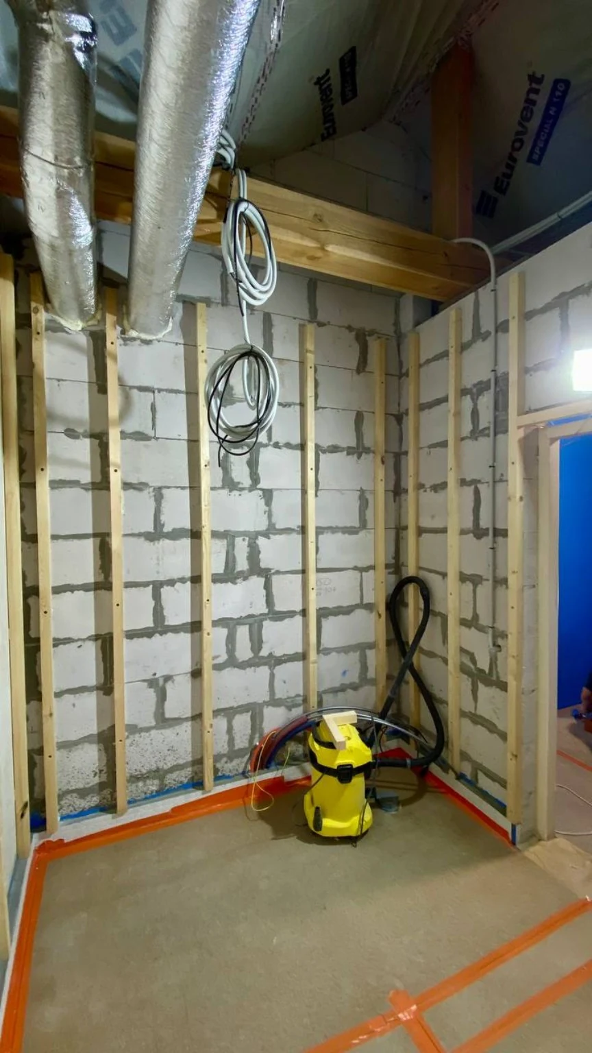 Construction: exposed masonry, timber furring, ductwork and electrical preparation