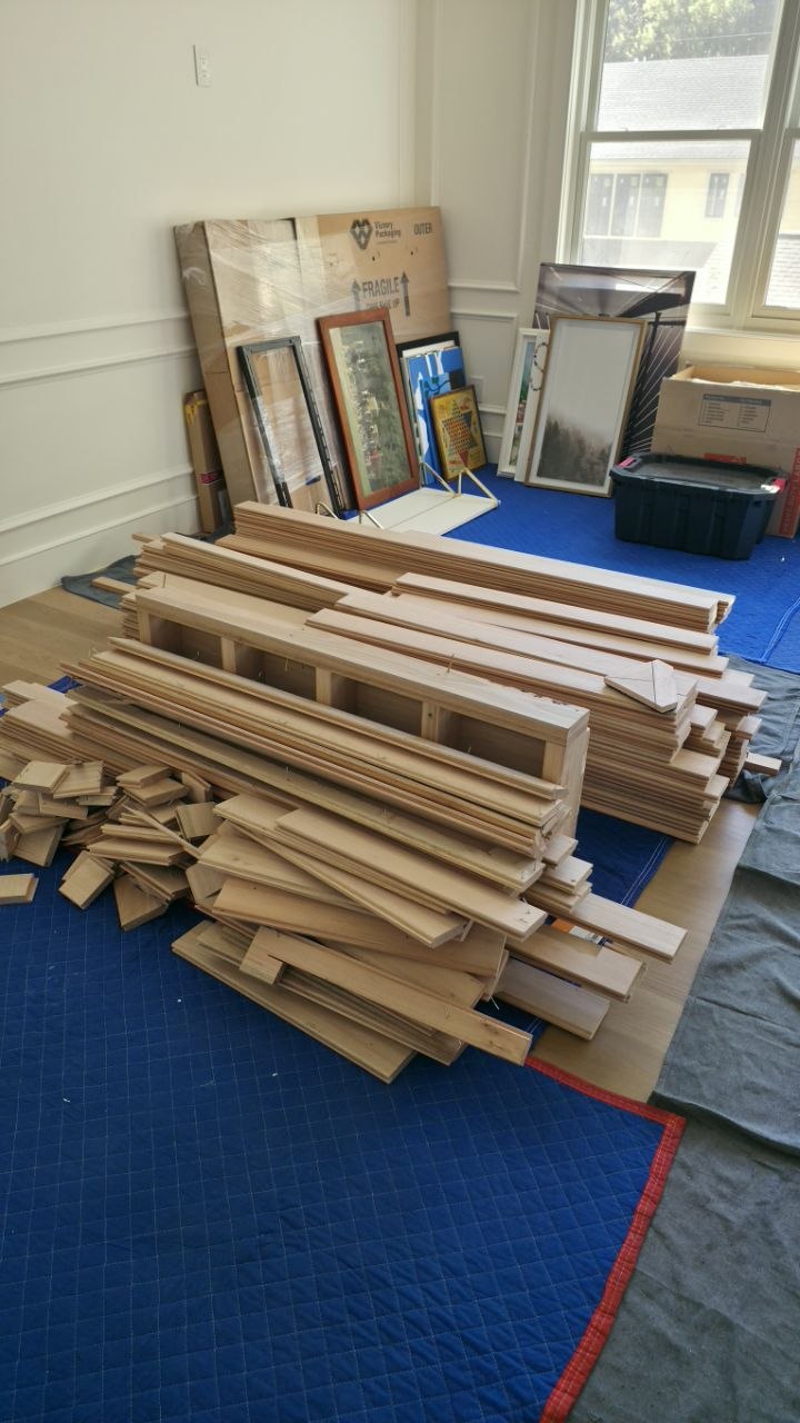 Customer-supplied wood components and heating panels before assembly