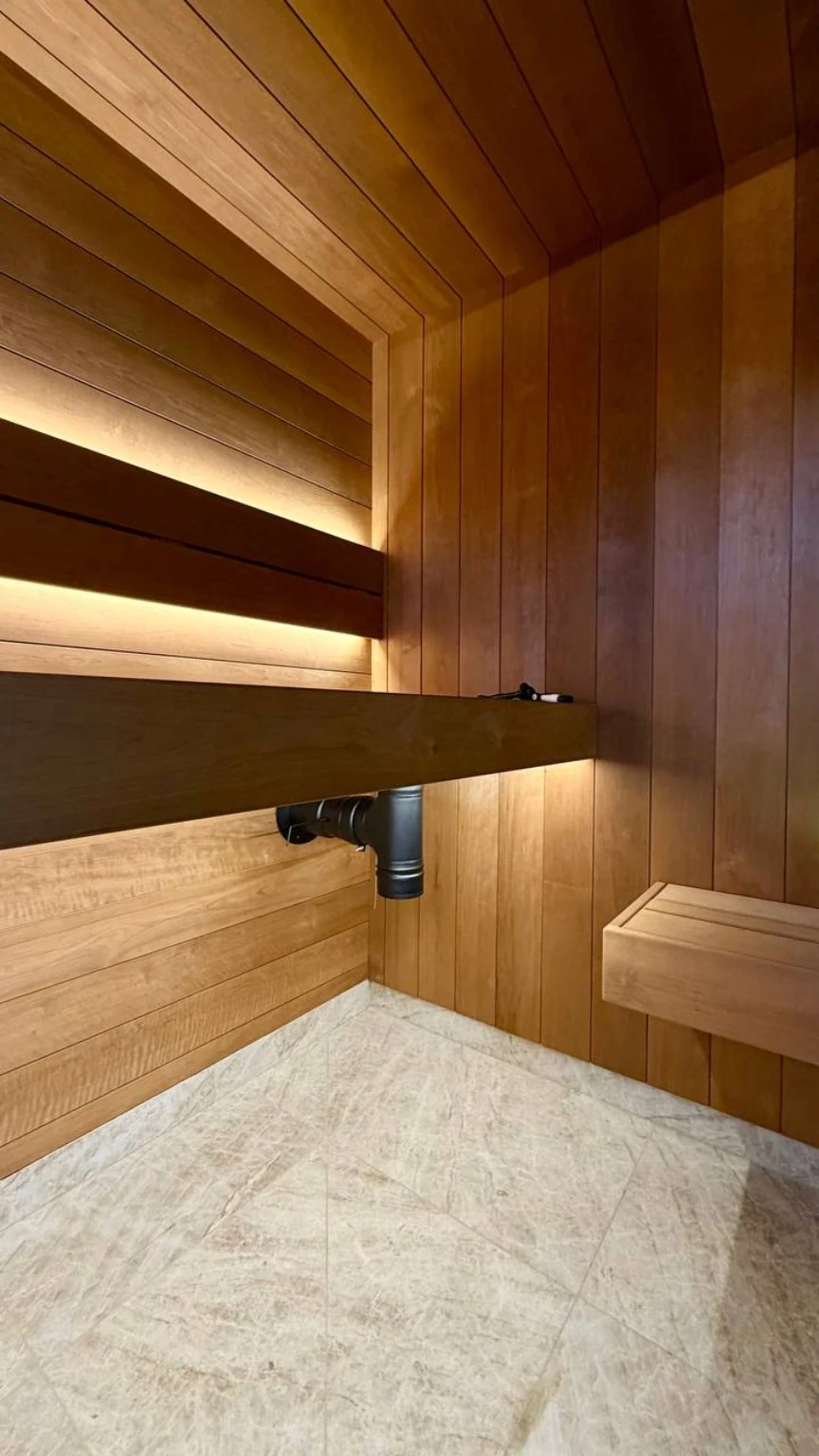 Under-bench ductwork integrated with the wood interior