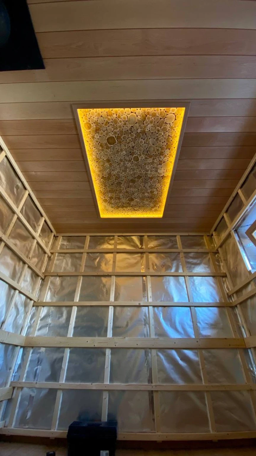 Ceiling feature installed above the foil-lined wall framing