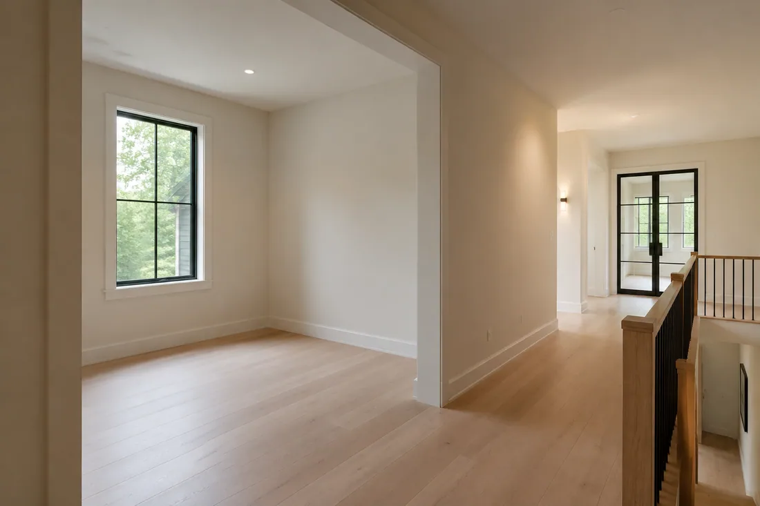 Adaptable residential alcove beside an upper-floor hallway